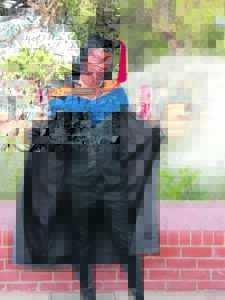 Graduate triumphs over adversity