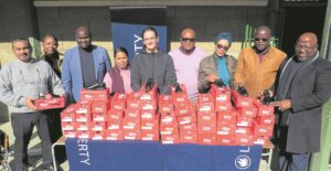 Handing over footwear to keep scholastic dreams kicking