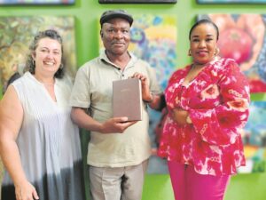 Pastor receives first copy of luxury Sotho Bible