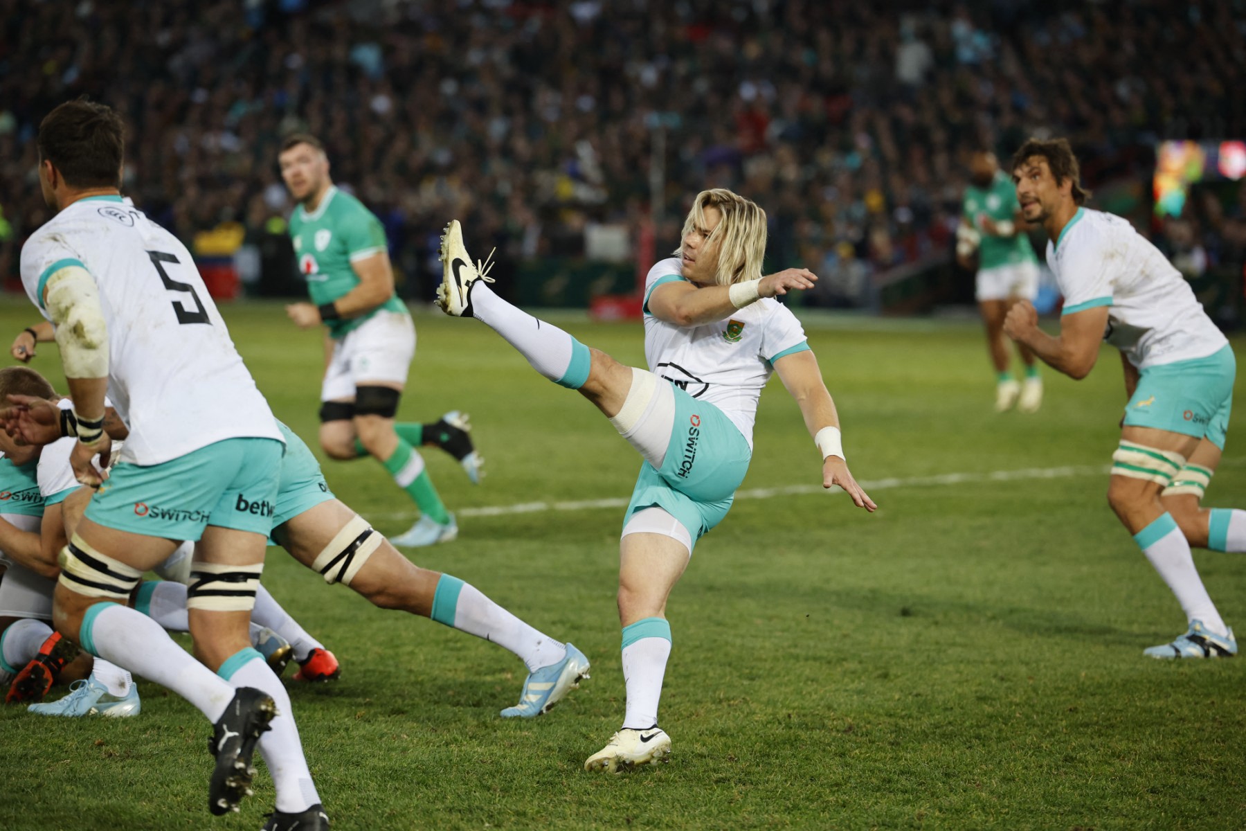 South Africa's scrum-half Faf de Klerk kicks the ball during the first Rugby Union test match between South Africa and Ireland