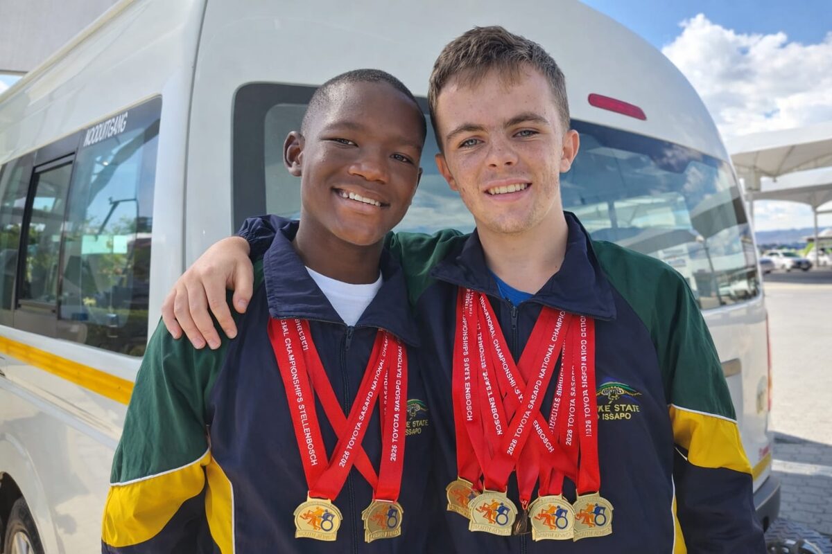 Calvin Ntoko and Anthony Snyman with the medals they won in para-athletics.