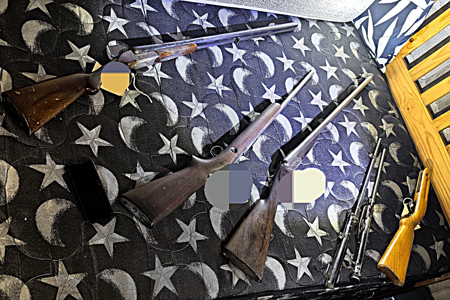 High-calibre rifles discovered hidden at a private residence