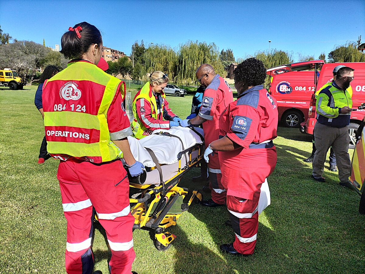Personnel from Life EMS demonstrating to learners how to respond to emergency situations.