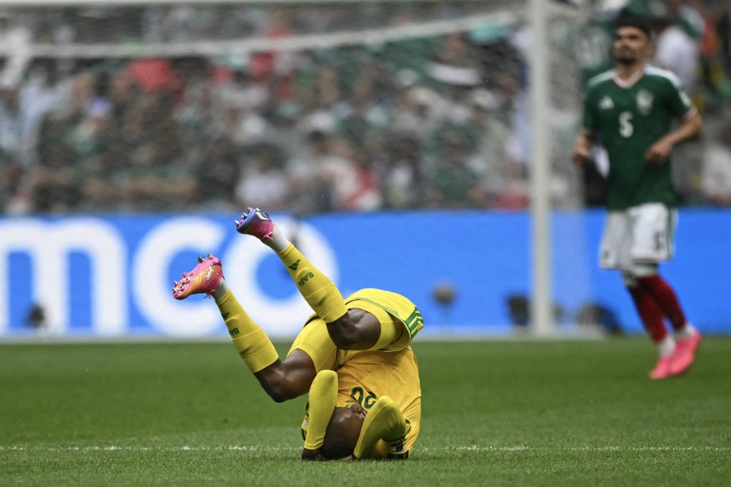 Bafana Bafana defender Khuliso Mudau takes a tumble.