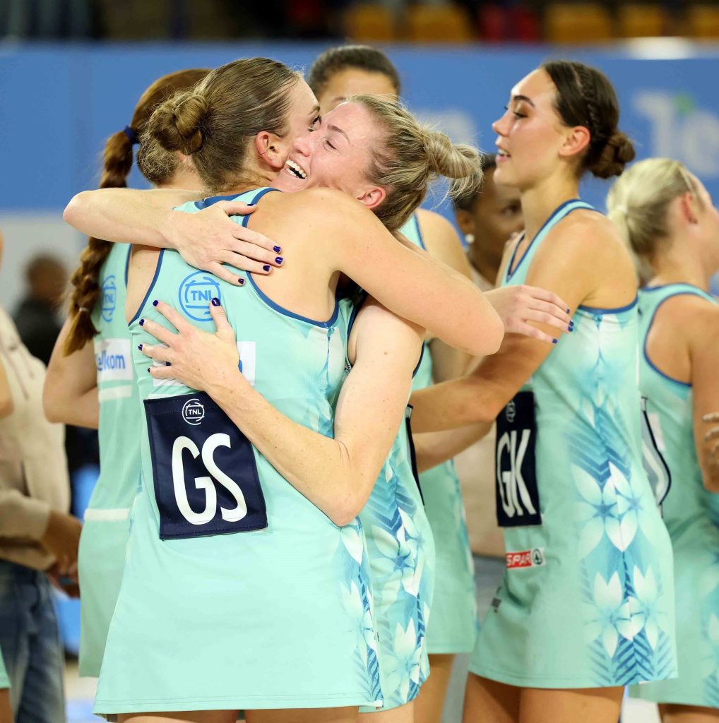 Crinums players celebrate after winning their fifth Telkom Netball League crown