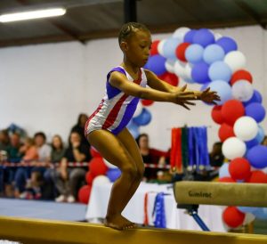 Acrobats and gymnasts keep a fine balance in competition
