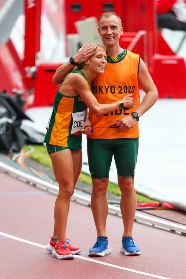 South African blind paralympic runner Louzanne Coetzee with her guide Claus Kempen