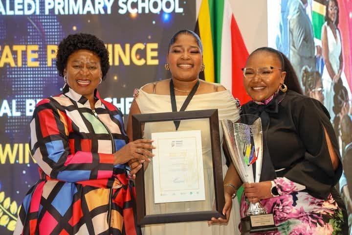 Mpho Mosala, middle who scooped the Best Teachers award with Deputy Minister of Basic Education Dr. Reginah Mhaule and Minister of Basic Education Siviwe Gwarube