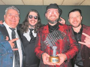 Band riding a big wave