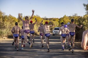 Men with purple speedo’s take to the streets in Bloemfontein