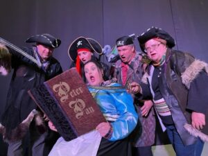 Aksie, pret wag op verhoog