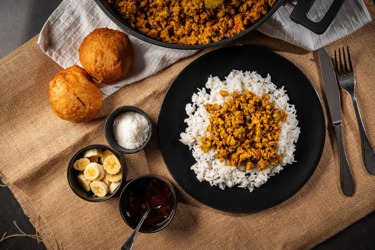 Savory flavoured pork mince: A must-try curry dish served with vetkoek or rice
