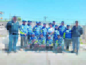 Community in Blue in Gugulethu receive jackets to keep them warm on winter mornings