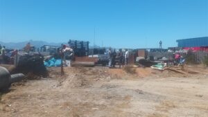 Meat-stall owners from Embengweni block relocate shack dwellers from erecting new shacks