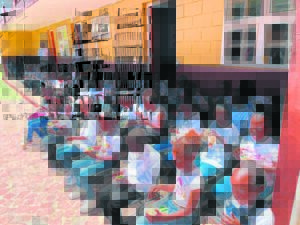 Grade R learners at Umnqophiso Pre-Primary School in Lwandle graduate with style