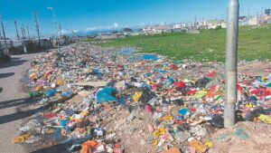 Crossroads residents complain of rubbish dumped in pond