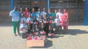 Shoes donated to schoolchildren at Mokone Primary School in Langa