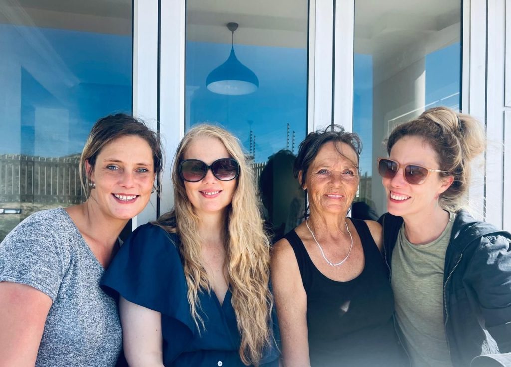 A family picture of Vanessa van Rensburg with her two sisters and mother.