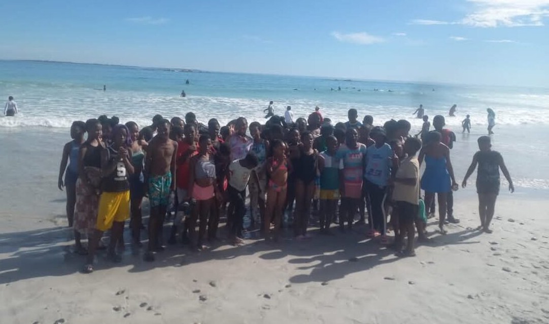 Following a shack fire that displaced over 600 people in Enkanini, Ward 86 councillor Xolani Diniso brought joy to affected children with a special Freedom Day beach outing—offering a moment of relief and hope amid hardship, while highlighting the need for continued community support and rebuilding efforts.