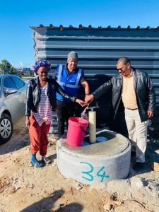 Level Two residents celebrate first communal taps installation