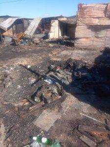 Devastating fire in Strand informal settlement leaves dozens without homes