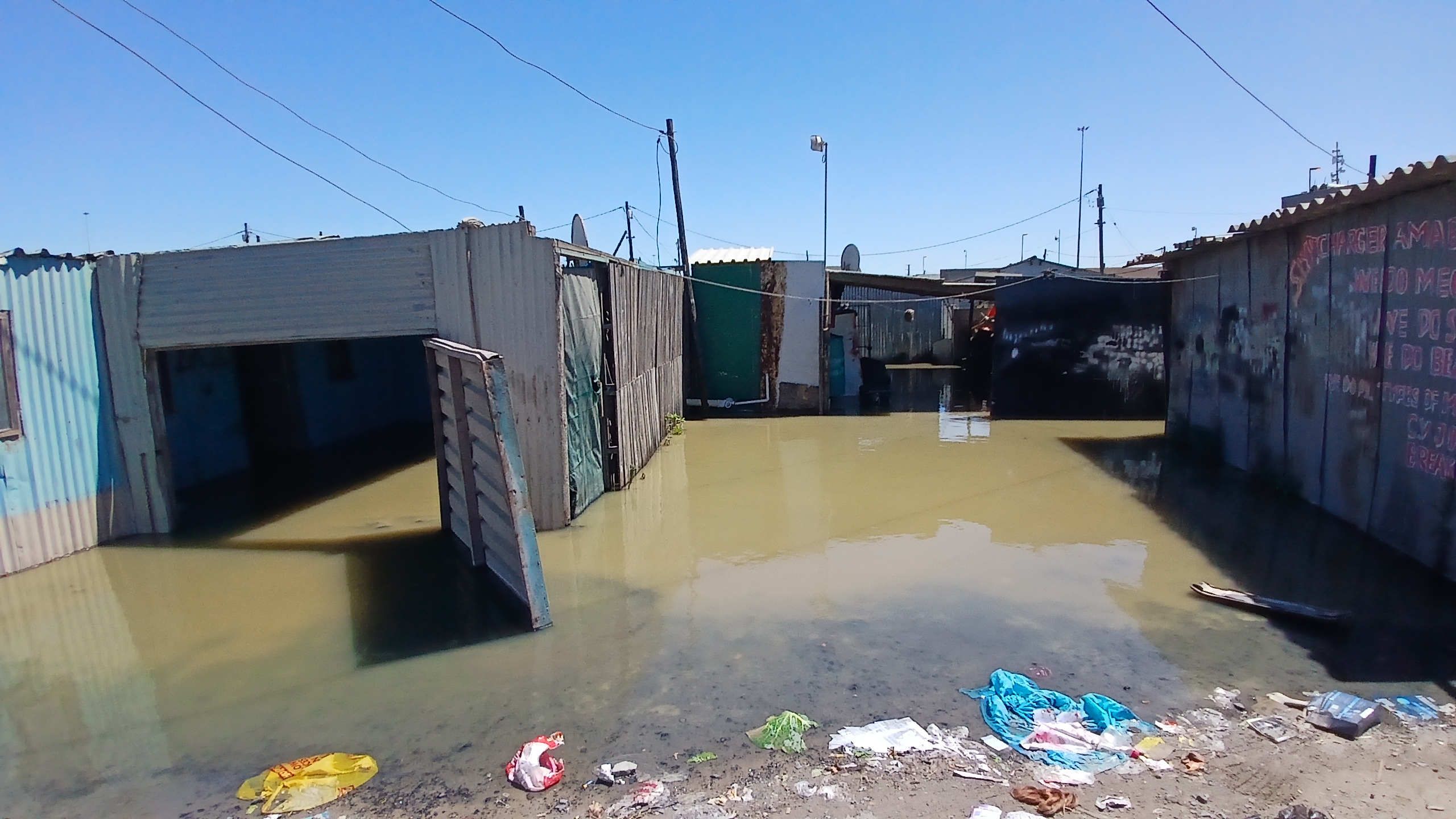 Sewage flood forces Makhaza shack dwellers to evacuate after pipe burst
