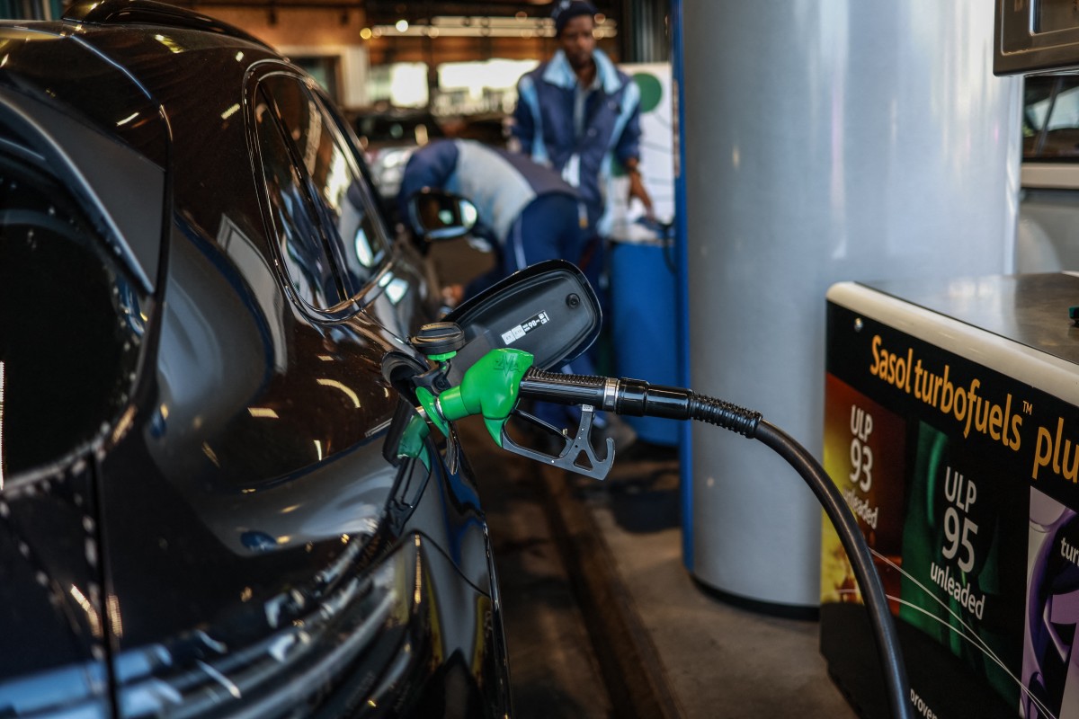 A vehicle is refuelled at a petrol station in Rosebank, Johannesburg. Photo: Phill Magakoe/AFP