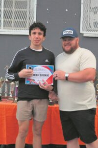 Ace wrestler is going for gold, needs coin