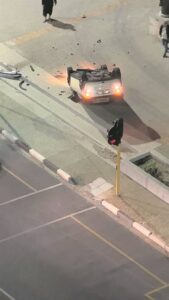 Vehicle overturns at Strand intersection