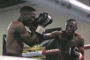 Strand boxer on the ropes to sweet victory