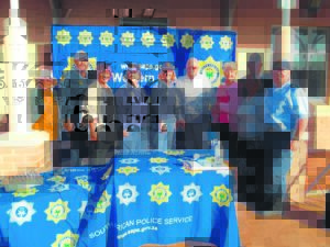 Crimefighters, spiritual leaders united in prayer