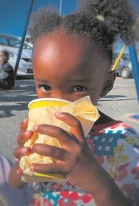 Reaching children, dogs