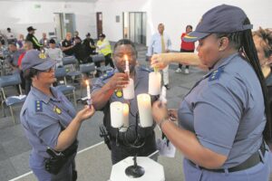 Candles lit in remembrance of fallen officers in blue