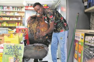 Man nabbed for shop fire