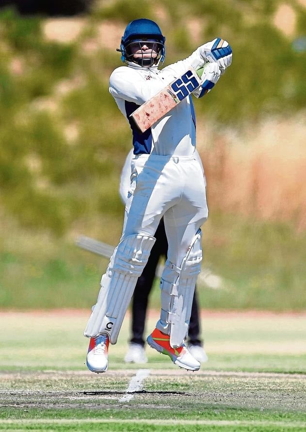 Paul Castignani goes aerial to play a difficult ba