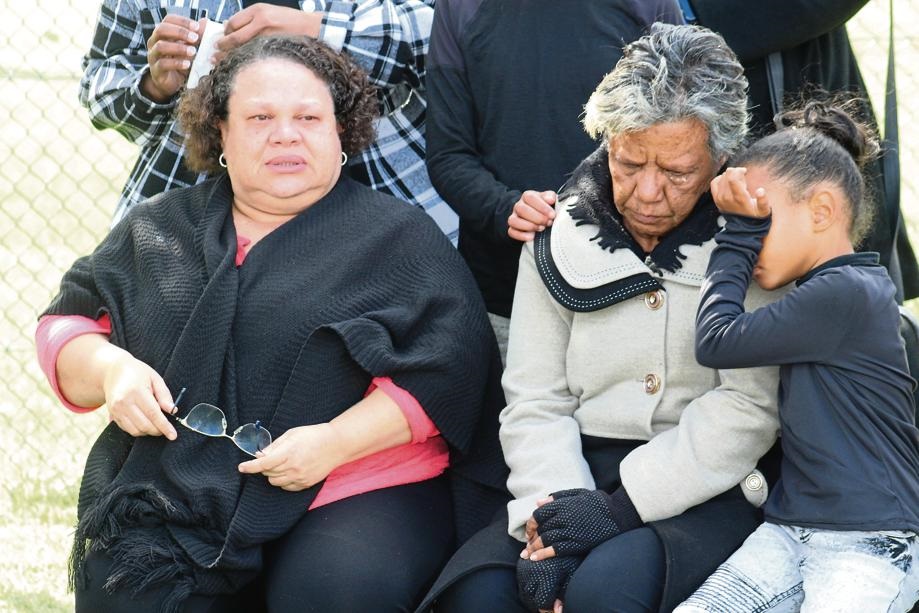 The bereaved relatives of Nico Angelo Samuels. Pic