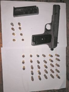 Police pounce on suspects, seize firearms