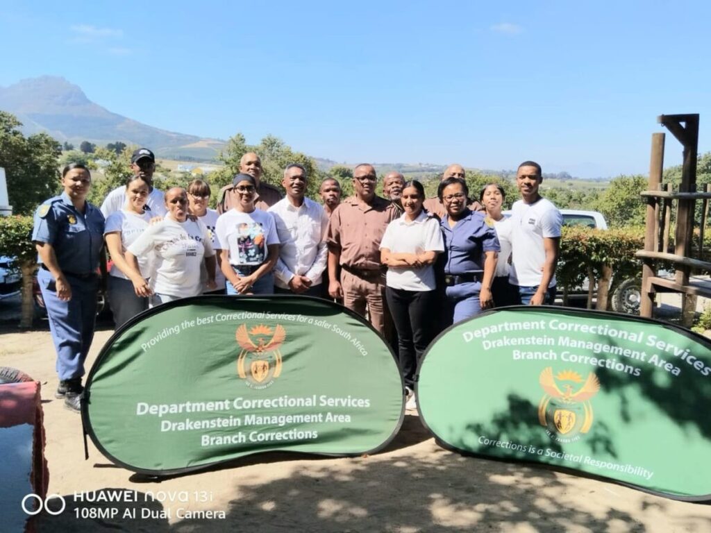 The Unathi Community Development group with representatives of the Somerset West police and Western Cape Correctional Services.