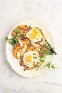 Parmesan crusted cauli-schnitzel with crispy fried egg