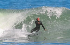 Adin catches some surf