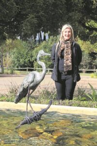 Bronze heron sculpture adorns picturesque pond at Vergelegen