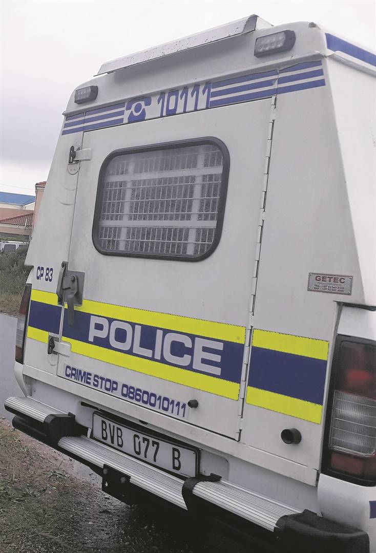 Police vehicle and officers at a crime scene in Helderberg area, responding to one of the May incidents reported in the crime brief.