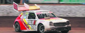 Track racer burns rubber to top