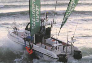 Boothengelaar snel paartjie te hulp nadat branders hul rubberboot omgooi