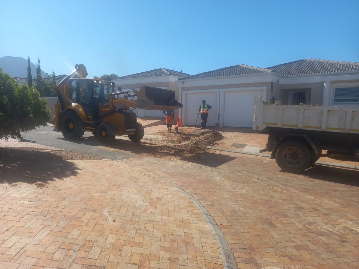 Municipal workers at the site of a burst pipe in Somerset West, two months after it was logged and just 24 hours after reporting it to the newspaper.