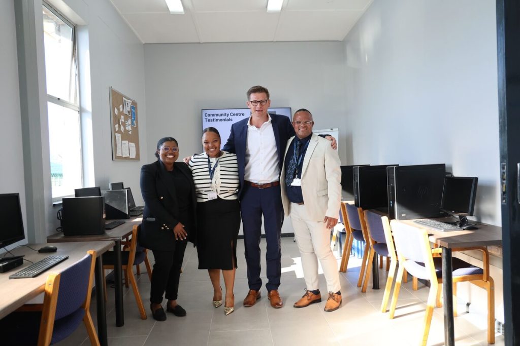 Yanga Fonley, Relebogile Diphoko, Dr Frank Dirksen, and Chris Janneke in the new computer room at Macassar Centre.