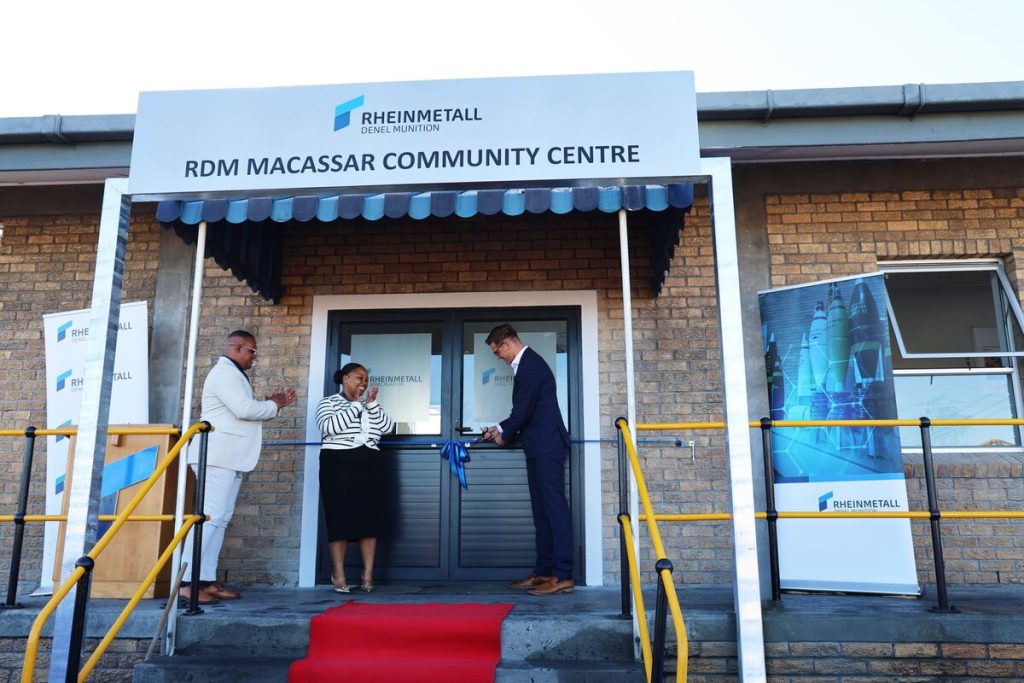Chris Janneke, Relebogile Diphoko, and Dr Frank Dirksen cutting the ribbon at the renovated Macassar Community Centre.