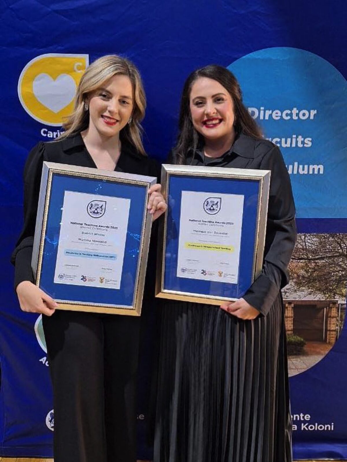 Mariska Niemand and Monique van Deventer from Altena Primary School showing their teaching excellence certificates.