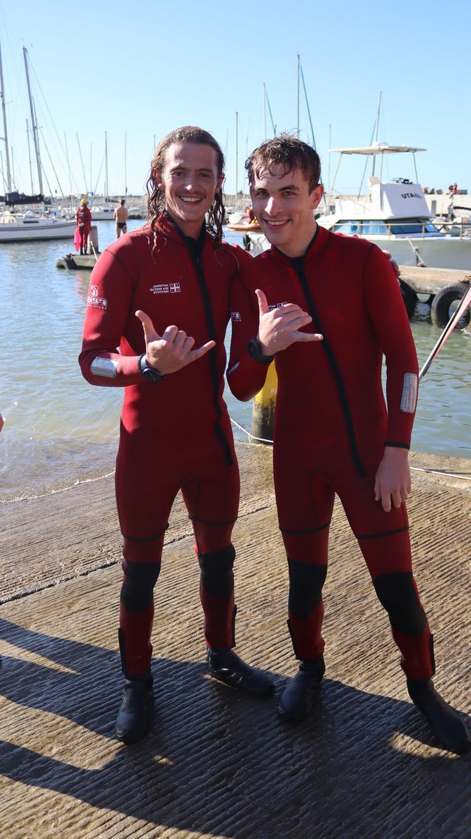 Nicolas Lorenzen and Stefan Botha after their cold-water swim during the NSRI Winter Solstice event in Gordon's Bay.