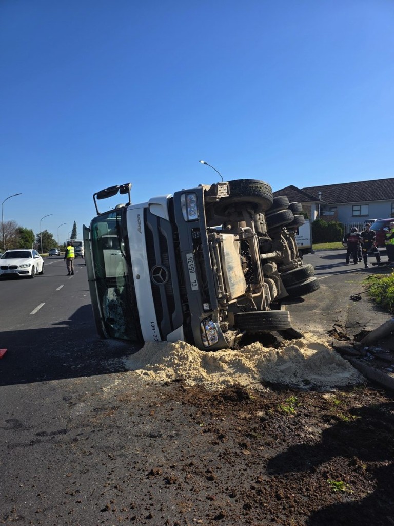 Emergency services at Main Road and Old Stellenbosch Road where concrete mixer truck overturned